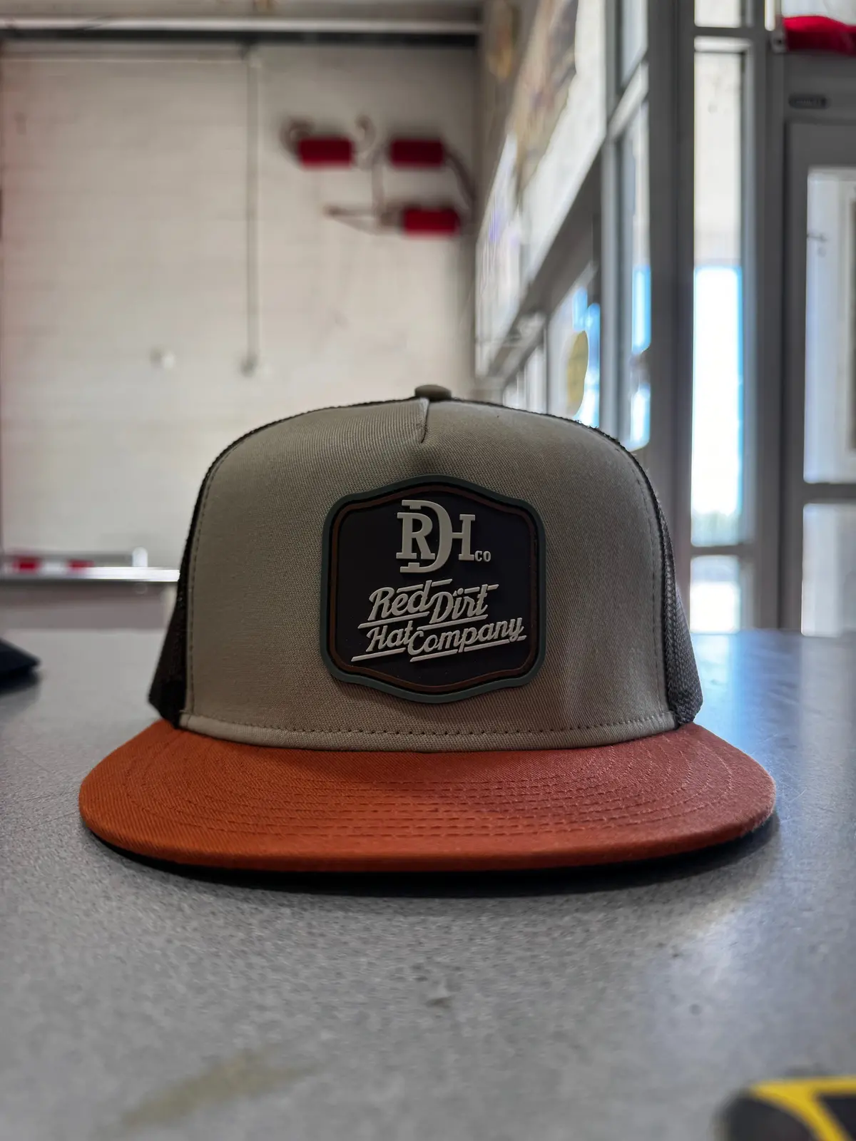 Back Country Branded Orange/Brown-Red Dirt Hat 1