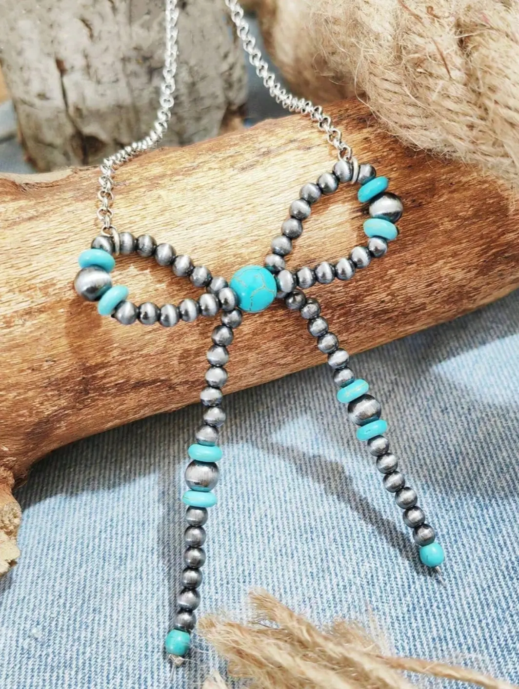 Necklace With Stunning Bow Pendant 1